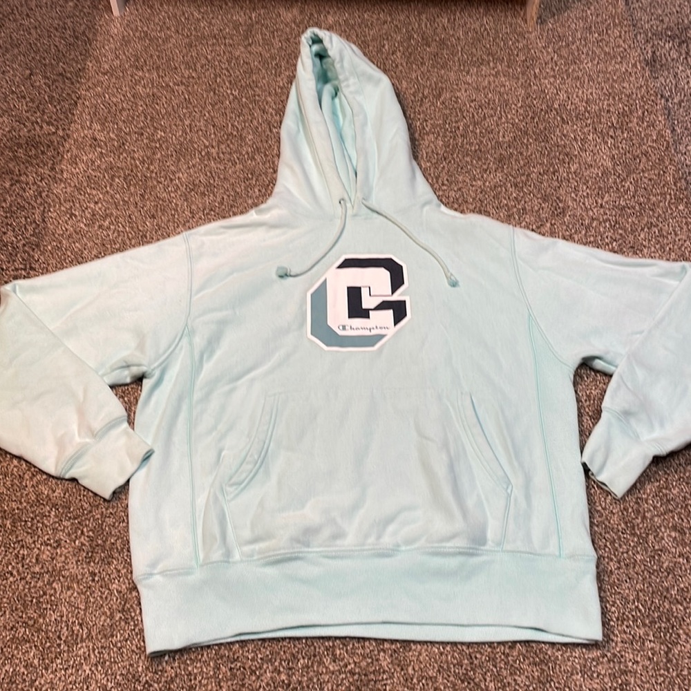 Champion hoodie. Men’s size M. Light blue.